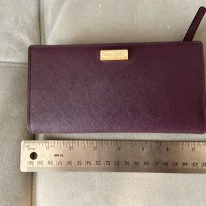 Eggplant Kate Spade Wallet with Snap Closure